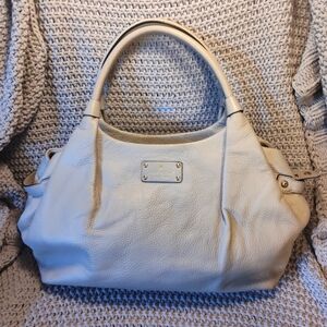 Kate Spade purse, pebbled leather beige color